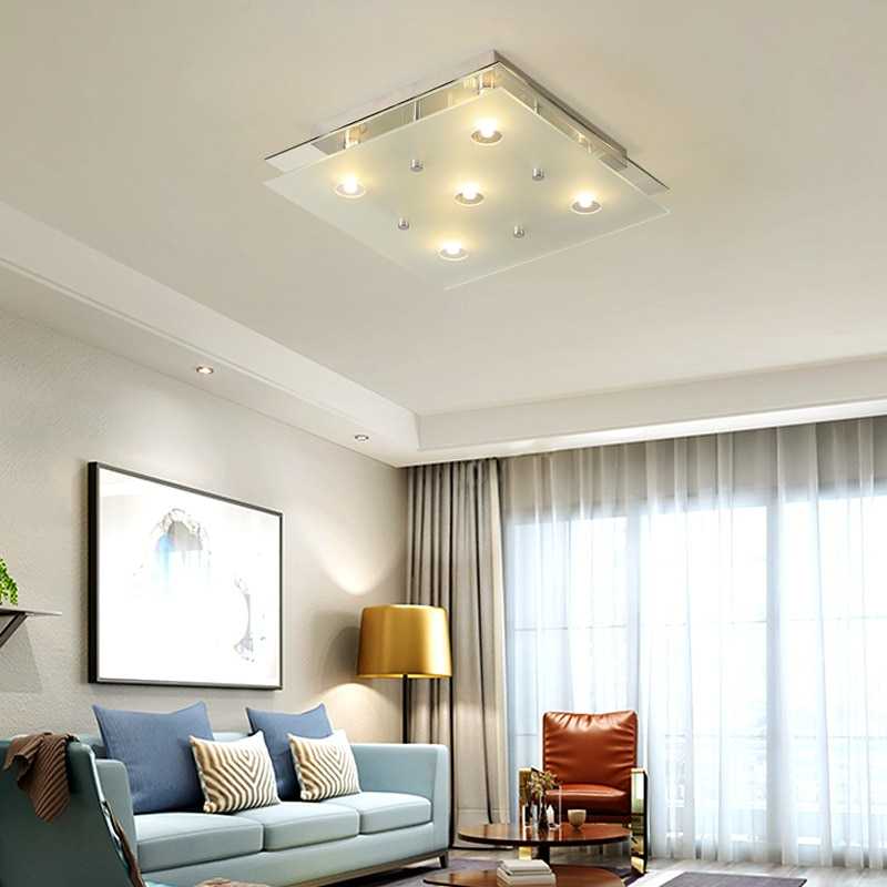 Белый глянцевый натяжной потолок (28 фото): конструкции с лампочками в интерьере